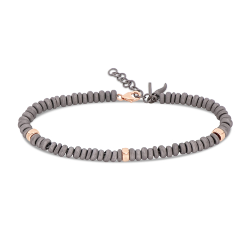 Accedi alla scheda di Mano | J . BRACCIALE UOMO CON ANELLINI IN TITANIO E ORO ROSSO 9 KT - ABR1AR3
